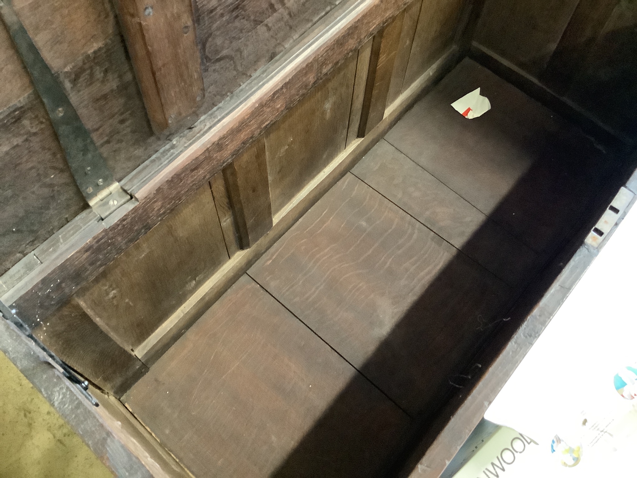 An 18th century marquetry inlaid oak coffer, width 130cm, depth 56cm, height 68cm